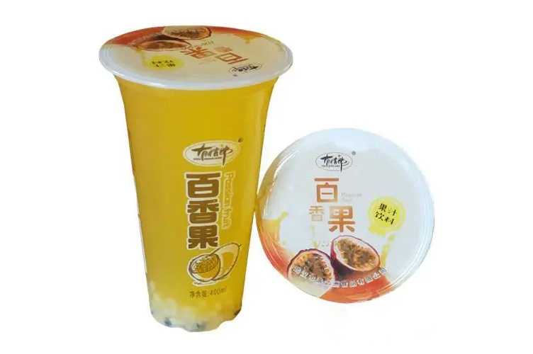 全自動(dòng)杯裝果汁飲料灌裝封口機(jī)：開啟果汁新風(fēng)尚